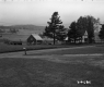 House and Barn by Road
