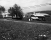 House and Barn by Road