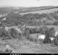 Wooded Slopes and Houses