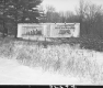 Billboards in Snowy Field