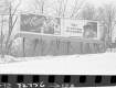 Billboards by Snowy Field