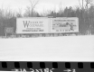 Billboards by Snowy Field