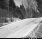 Wire Fence by Paved Road