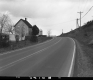 House and Silo by Paved Road