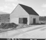 Barn by Paved Road