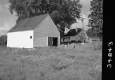 Barn and House by Road