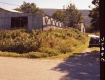 Car by Barn