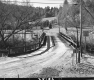 Dirt Road over Wooden Bridge