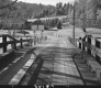 Wooden Bridge and Dirt Road