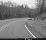 Car on Paved Road