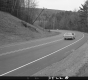 Car on Paved Road