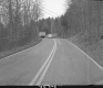Truck and Bug on Paved Road