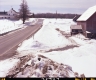 Barn by Paved Road