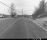 Car and Trailer by Paved Road