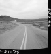 Car by Paved Road