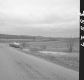 Car by Paved Road