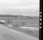 Car by Paved Road