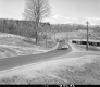 Car on Paved Road