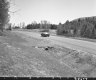 Car on Paved Road