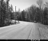 Car by Paved Road