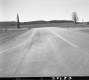 Car on Paved Road