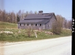 House by Paved Road