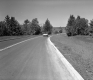 Car on Paved Road
