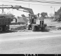 Backhoe by Paved Road