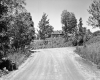 Dirt Road and House