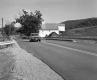 Car on Paved Road