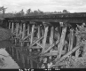 Side view of Wooden Railroad Bridge with Wooden Supports