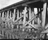 Side view of Wooden Railroad Bridge with Wooden Supports 3