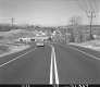 Car on Paved Road