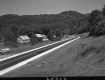 Car on Paved Road