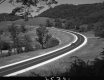 Car on Paved Road