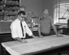 Two engineers at table