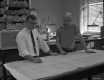 Two engineers at table