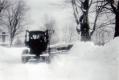 State Grader in Peru village plowing snow