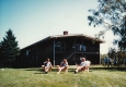 Campers Relaxing by Cedar Lodge