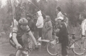 Bike Racer Passing Crowd of Spectators