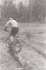 Biker Balancing on Log