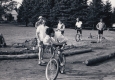 Bicycle log pull with spectators