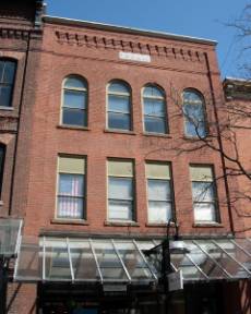 Richardsonian Romanesque with Colonial Revival Details